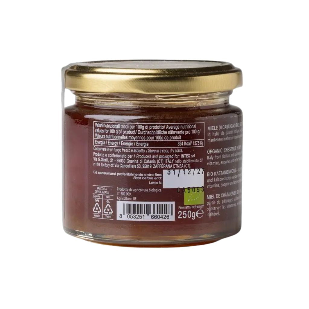 Glas mit dunklem Kastanienhonig und Deckel, Honig im Glas sichtbar, naturbelassen, cremige Textur, Detailaufnahme der Glasrückseite.